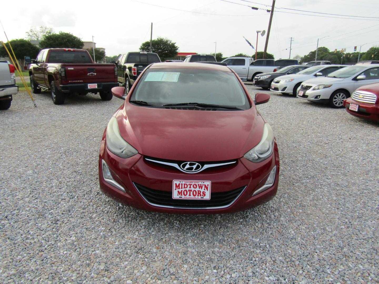 2016 Red /Gray Hyundai Elantra Limited (5NPDH4AE2GH) with an 1.8L L4 DOHC 16V engine, Automatic transmission, located at 15016 S Hwy 231, Midland City, AL, 36350, (334) 983-3001, 31.306210, -85.495277 - Photo#1